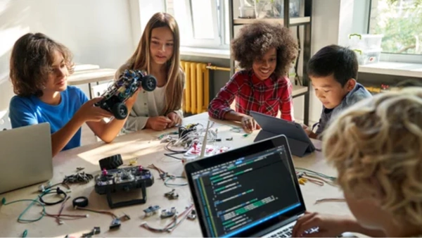 Kids on computers at school.